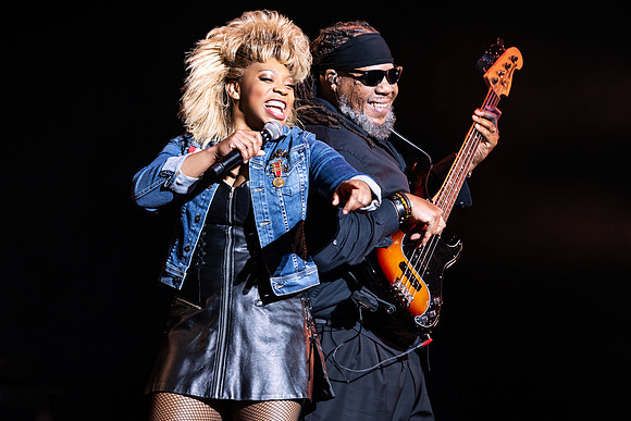 Ari Groover as 'Tina Turner' and John Toney (bass) in the North American tour of TINA - The Tina Turner Musical. Photo by Matthew Murphy for MurphyMade, 2023.